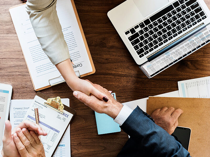 a man and woman shaking hands